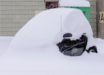 Smart Car covered in snow