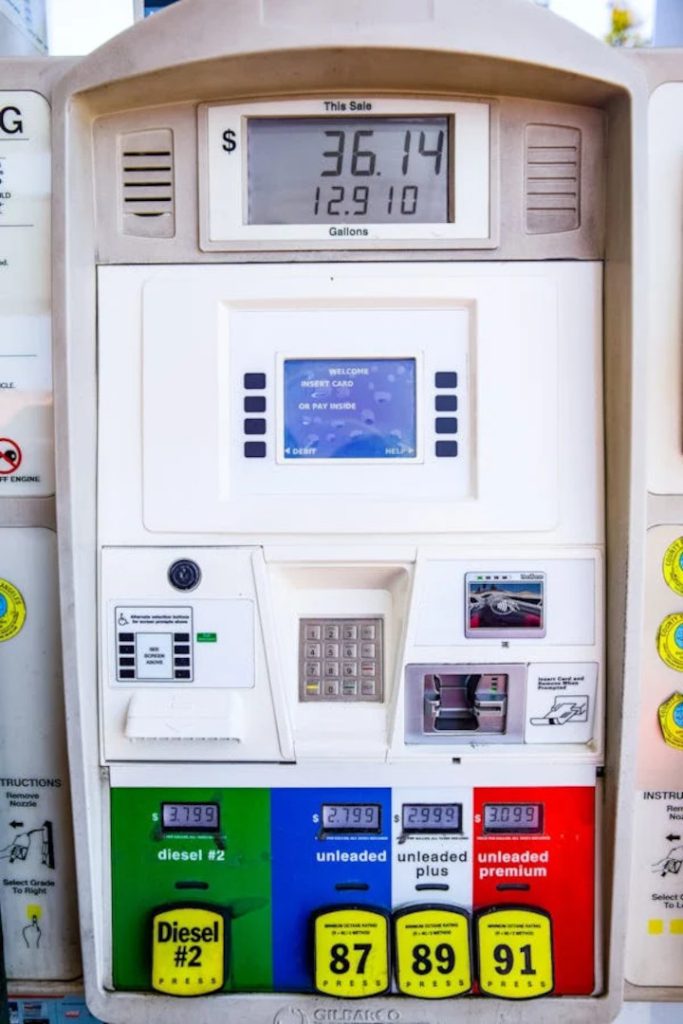 Front view of a gas pump showing buttons for all grades of gas.